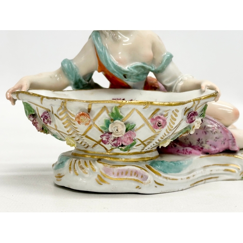 23 - A pair of large Late 19th Century Meissen figural table salts/sweet meat dishes. Modelled after J.J.... 