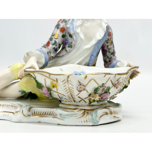 23 - A pair of large Late 19th Century Meissen figural table salts/sweet meat dishes. Modelled after J.J.... 