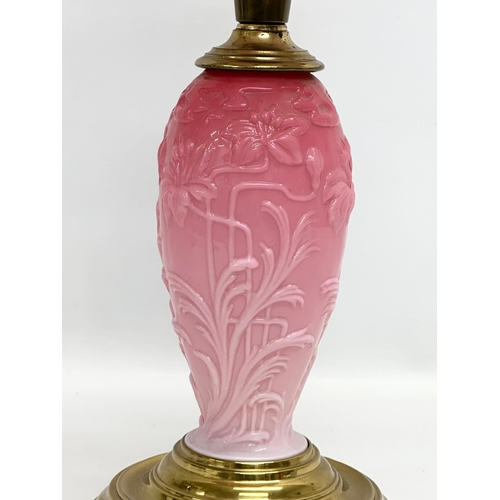 119 - A large Late 19th Century Victorian double burner, opaline glass oil lamp. With diamond shade, embos... 