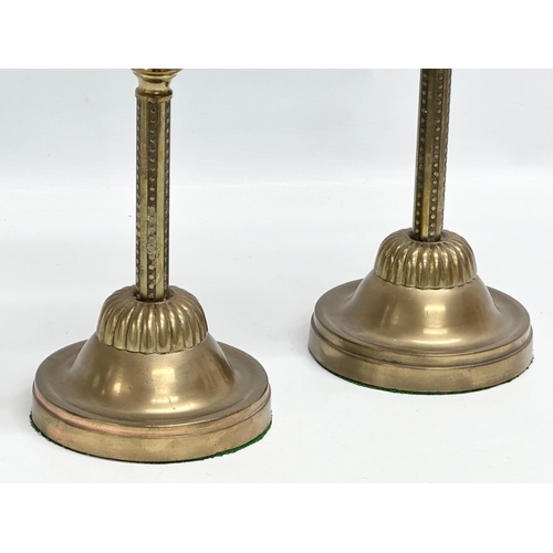 120 - A pair of Late 19th Century Victorian piano oil lamps. With ceramic bowls on brass columns. 49cm