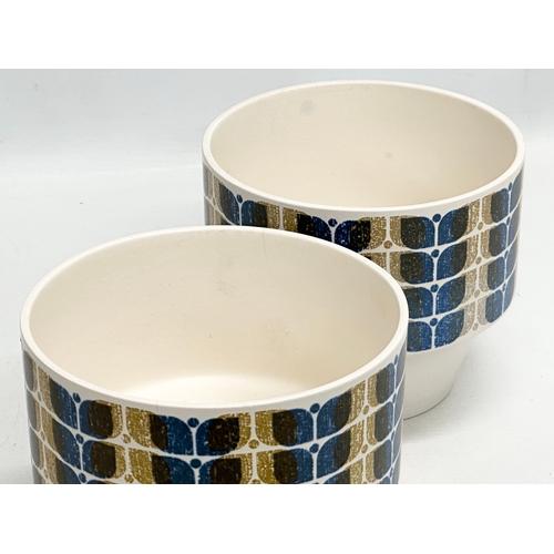 335 - John Clappison For Hornsea. A pair of Mid Century pottery planters. Designed by John Clappison for H... 