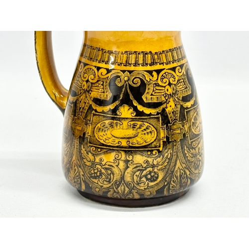 515 - A Late 19th Century Doulton Burslem “Jacobean” pottery jug. Ye Old Belle. 12x17cm.