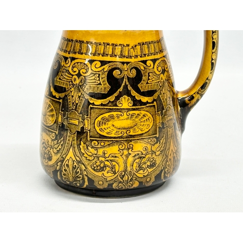 515 - A Late 19th Century Doulton Burslem “Jacobean” pottery jug. Ye Old Belle. 12x17cm.