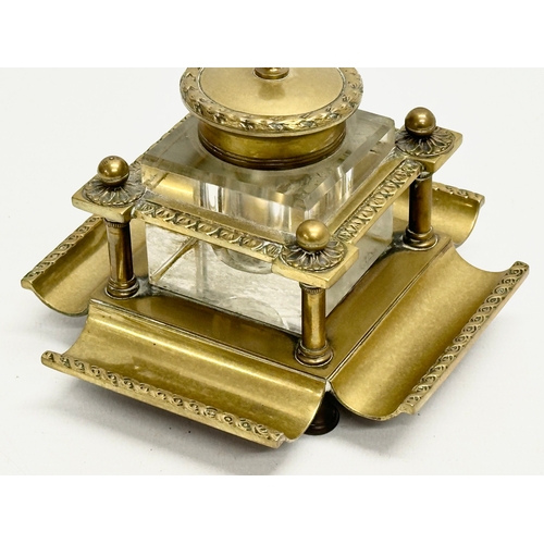 181 - A Late 19th Century Victorian brass inkstand with cut glass inkwell. 12x12x10cm.