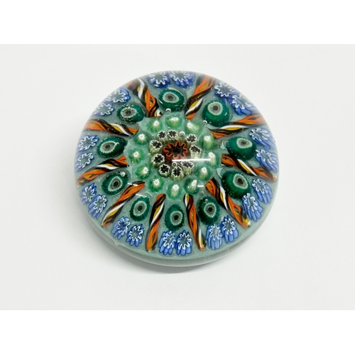 103 - A Vasart millefiori glass paperweight. 7.5x6cm.