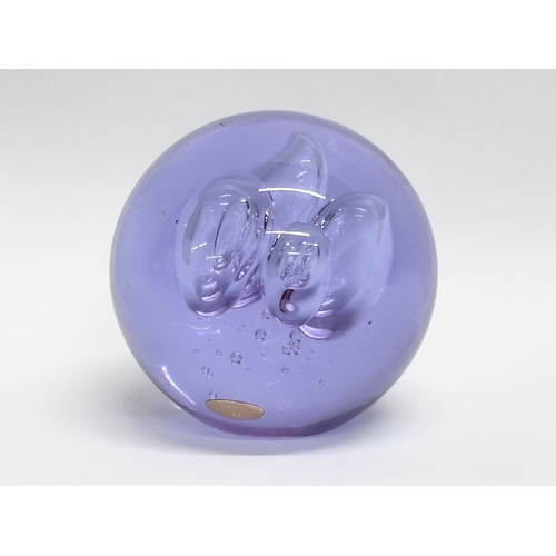 106 - A vintage Czechoslovakian glass paperweight. 7x8cm