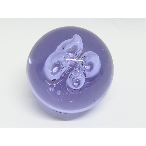 106 - A vintage Czechoslovakian glass paperweight. 7x8cm