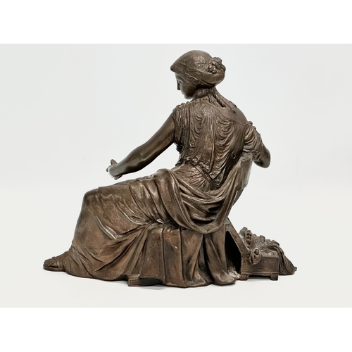 127 - A large 19th Century cast iron sculpture of a Neoclassical seated lady. 30x27cm.