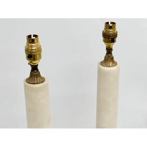 511 - A pair of tall Mid 20th Century brass and marble table lamps. 67cm with shades.