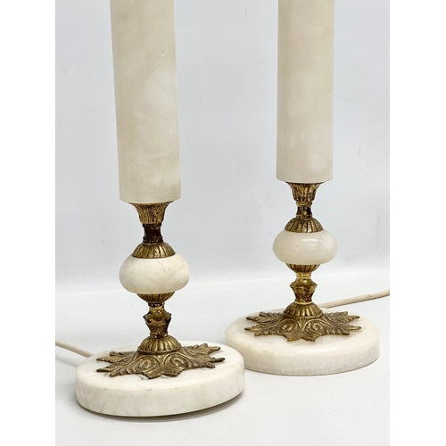 511 - A pair of tall Mid 20th Century brass and marble table lamps. 67cm with shades.