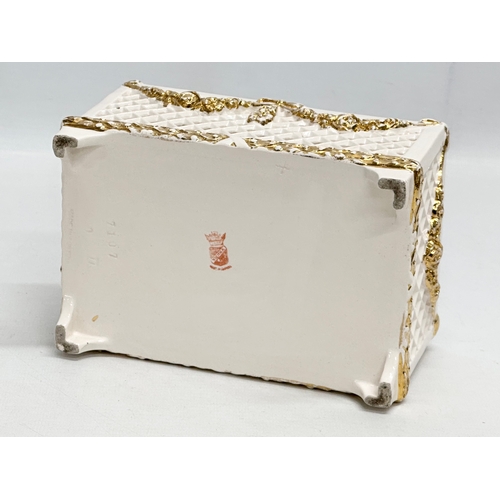 183 - Ernst Wahliss. A Late 19th Century Austrian hand painted reticulated pottery box with cover. Turn Vi... 