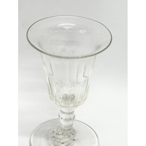 162 - A Mid 18th Century George II slice cut gin glass with bell shaped bowl. Circa 1750. 6x10.5cm.