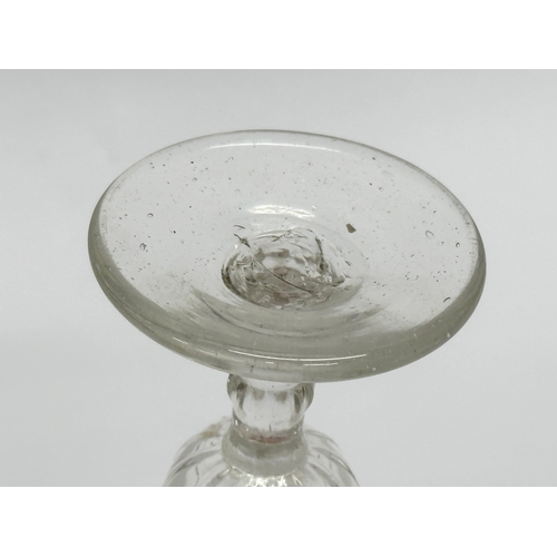 162 - A Mid 18th Century George II slice cut gin glass with bell shaped bowl. Circa 1750. 6x10.5cm.