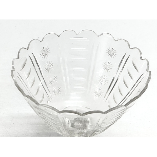 164 - A Late 19th Century star and slice cut compote/candy dish with hollow glass column. 14x14cm.