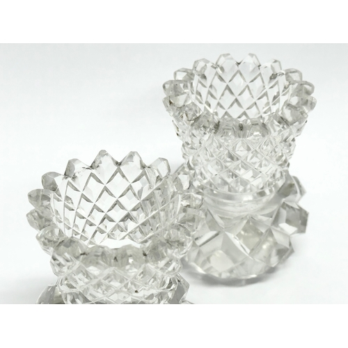 418 - A collection of Late 19th and Early 20th Century glassware. A pair of small Victorian diamond cut bu... 