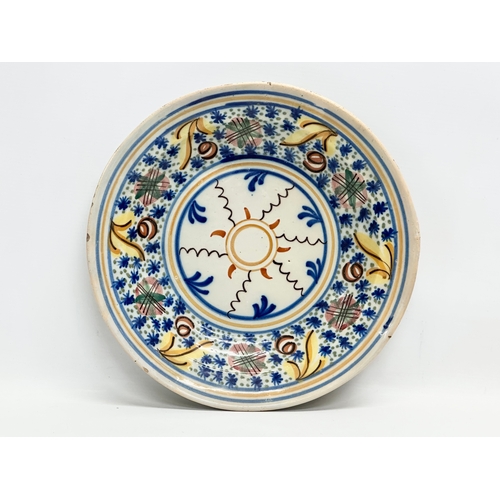 188 - Two 19th Century Italian and Dutch delft plates. 31cm. 27cm.