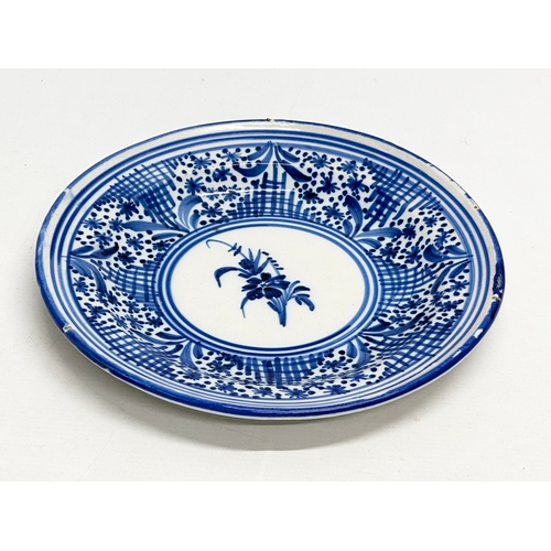 188 - Two 19th Century Italian and Dutch delft plates. 31cm. 27cm.