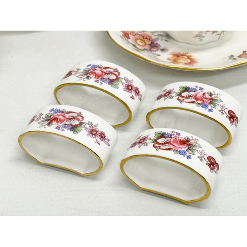 526 - A quantity of Royal Crown Derby “Posies” . Including tea cup, saucers and sandwich plate, 4 napkin r... 