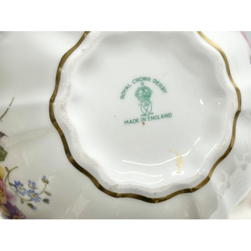 526 - A quantity of Royal Crown Derby “Posies” . Including tea cup, saucers and sandwich plate, 4 napkin r... 