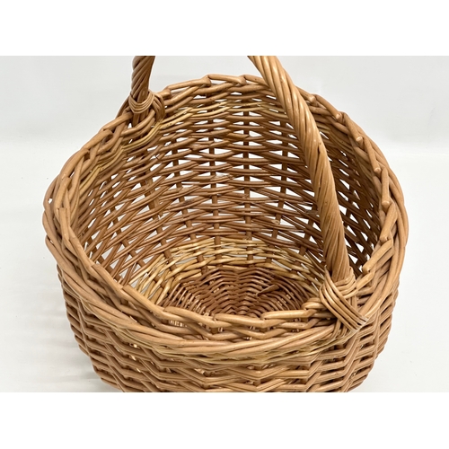 539 - A good quality wicker basket. 33x32x42cm