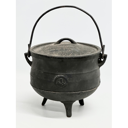 510 - 2 Late 19th/Early 20th Century cast iron cauldrons. 1 with shamrock logo, made in England. 25x23x19c... 