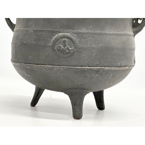 510 - 2 Late 19th/Early 20th Century cast iron cauldrons. 1 with shamrock logo, made in England. 25x23x19c... 