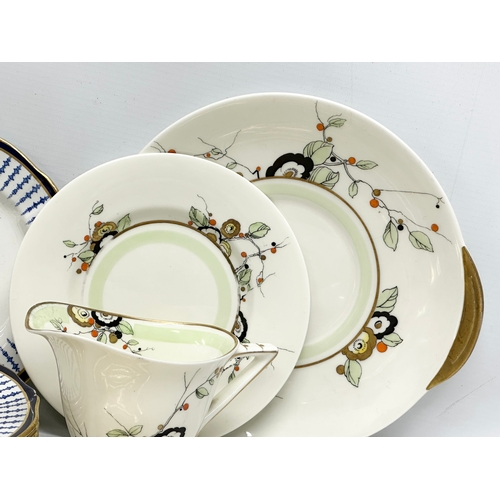 233 - A good collection of 19th and 20th Century saucers, sandwich plates and tea cups. Royal Crown Derby ... 