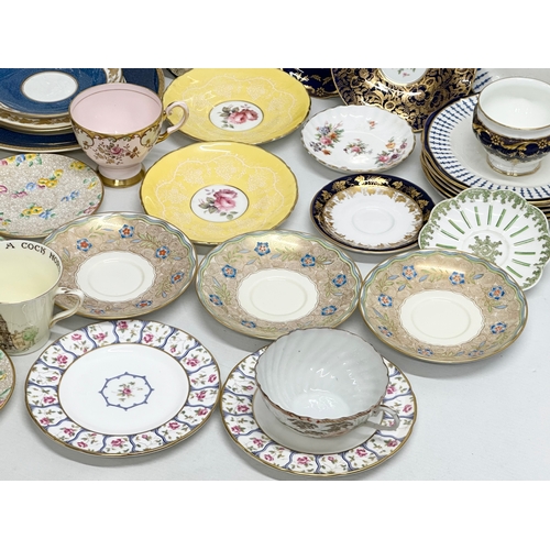 233 - A good collection of 19th and 20th Century saucers, sandwich plates and tea cups. Royal Crown Derby ... 