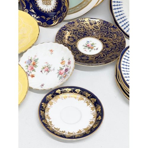 233 - A good collection of 19th and 20th Century saucers, sandwich plates and tea cups. Royal Crown Derby ... 