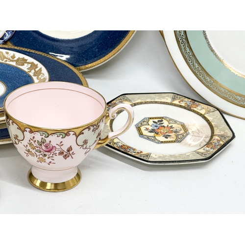 233 - A good collection of 19th and 20th Century saucers, sandwich plates and tea cups. Royal Crown Derby ... 