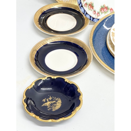 233 - A good collection of 19th and 20th Century saucers, sandwich plates and tea cups. Royal Crown Derby ... 