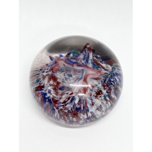 100 - A large 19th Century glass paperweight. 9x6.5cm.