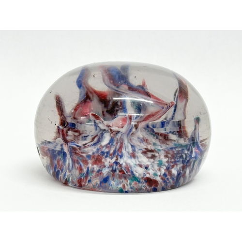 100 - A large 19th Century glass paperweight. 9x6.5cm.