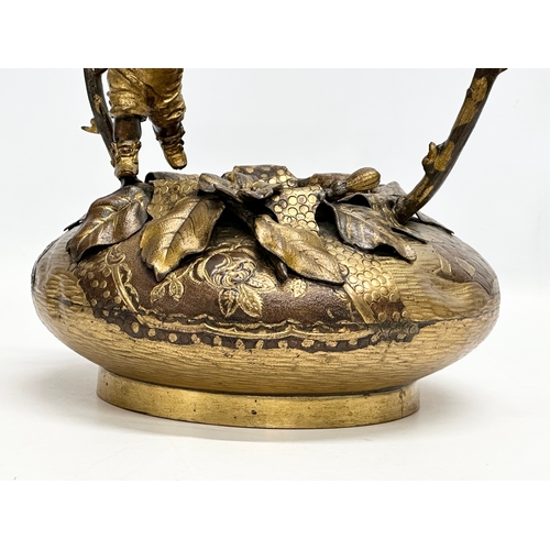 9 - A large 19th Century, French bronze and gilt spelter sculpture/basket, with playing boy on a branch ... 