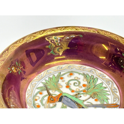 12 - A 1930’s Mintons lustre bowl. Hand painted, with enamel butterflies and bird design. 14x3cm.