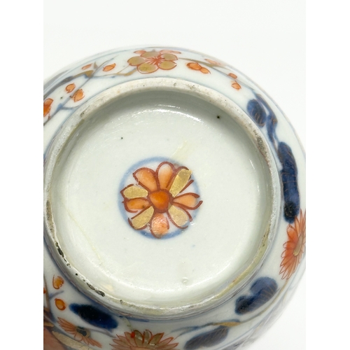 35 - A 17th/18th Century Japanese Imari cup. Edo Period (1603-1867) 8x9cm.