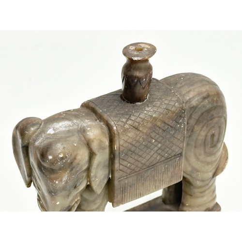 46 - A pair of  Late 19th Century Chinese soapstone elephants. 13x14cm.