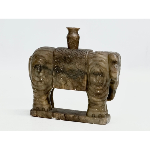 46 - A pair of  Late 19th Century Chinese soapstone elephants. 13x14cm.