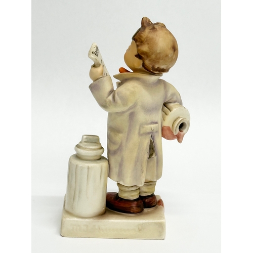 555 - A West German M.J. Hummel Goebel Pottery figurine. Little Pharmacist. 14cm