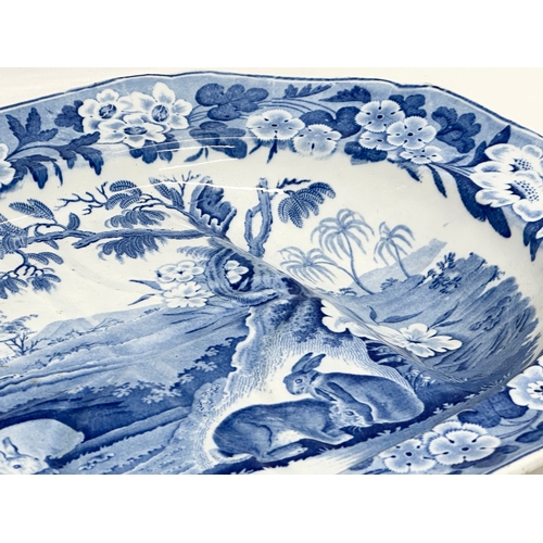 26 - An Early 19th Century “Grazing Rabbits” turkey platter. With Bow Porcelain style mark (1744-1776). C... 