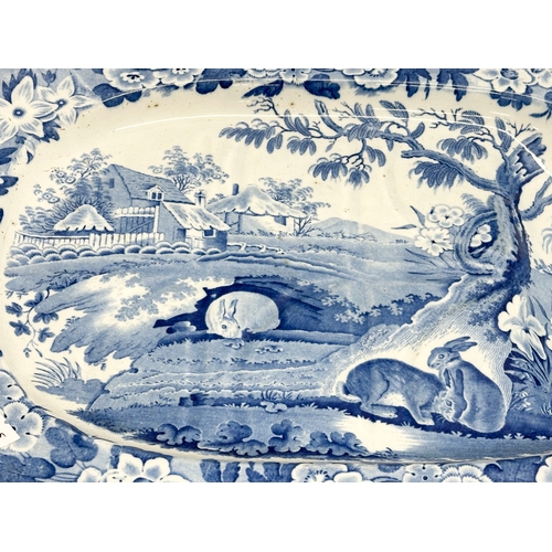 26 - An Early 19th Century “Grazing Rabbits” turkey platter. With Bow Porcelain style mark (1744-1776). C... 