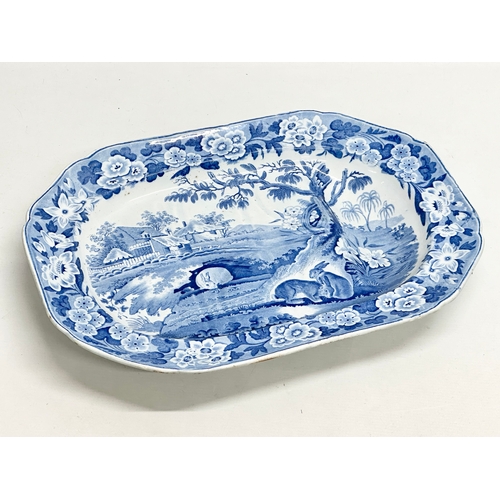 26 - An Early 19th Century “Grazing Rabbits” turkey platter. With Bow Porcelain style mark (1744-1776). C... 