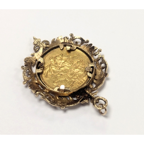 586 - A Victorian gold Sovereign mounted in a 9ct ornate gold mount. Young Victoria head dated 1881. (9ct ... 