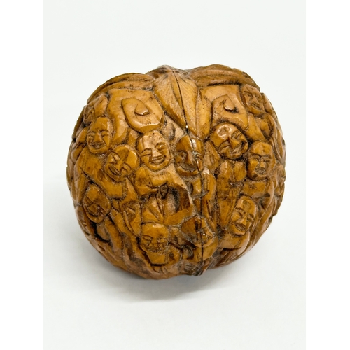 131 - A Late 19th Century Chinese Qing Dynasty carved Hediao walnut.