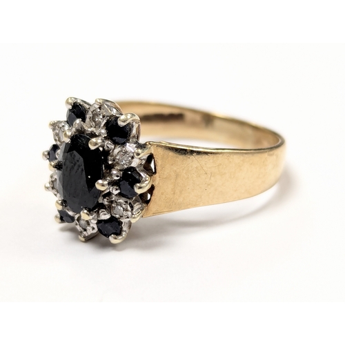 601 - A 9ct gold cluster ring. 4.5gr. Size UK P