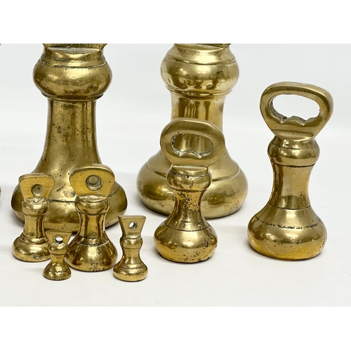 572 - Large Victorian heavy brass weights. 18cm. 15cm. 12cm