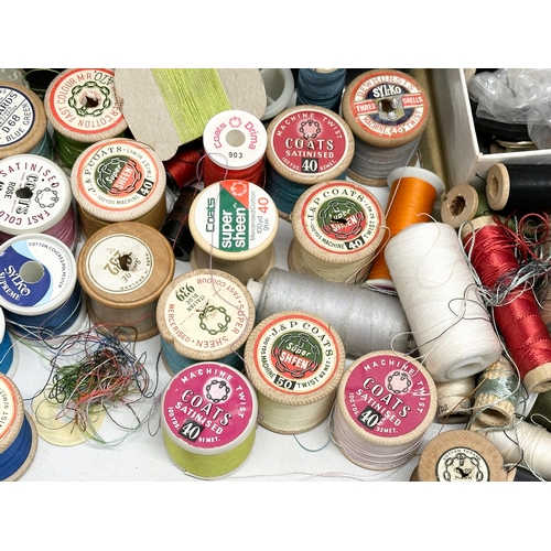 561 - A large quantity of vintage sewing equipment. J.P. Coats, Sylko, Clark & Co, Sylvia. Silk reels, but... 