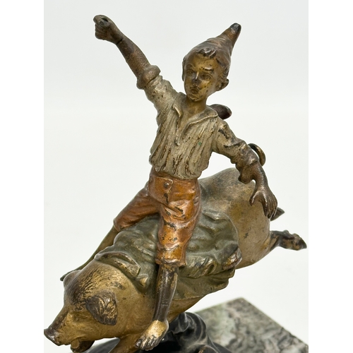 5 - Franz Bergmann. An Early 20th Century bronze “On A Pigs Back” figurine. Signed. On a marble base. Bo... 