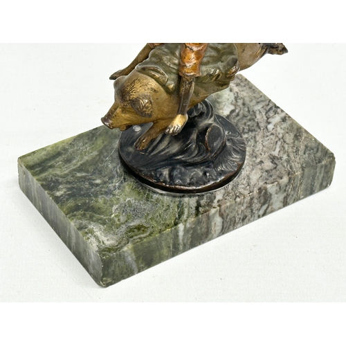 5 - Franz Bergmann. An Early 20th Century bronze “On A Pigs Back” figurine. Signed. On a marble base. Bo... 