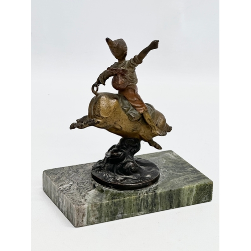 5 - Franz Bergmann. An Early 20th Century bronze “On A Pigs Back” figurine. Signed. On a marble base. Bo... 